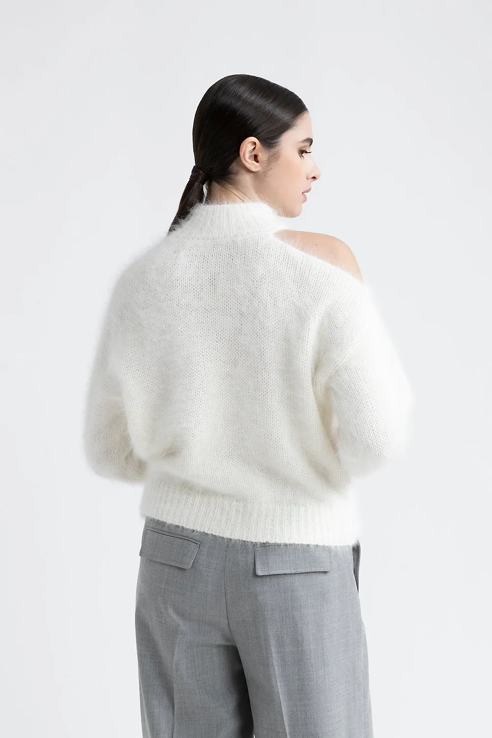 Angora wool sweater with cut out shoulder