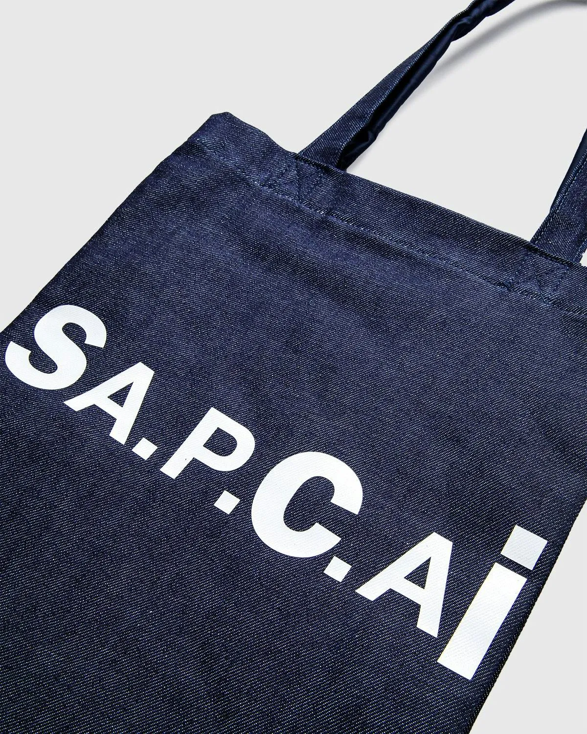 A.P.C. x Sacai – Tote Bag Holly Dark Navy | Highsnobiety Shop